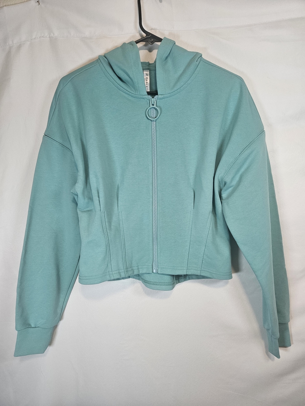 Fabletics Cropped Ring-Zip Hoodie in Teal